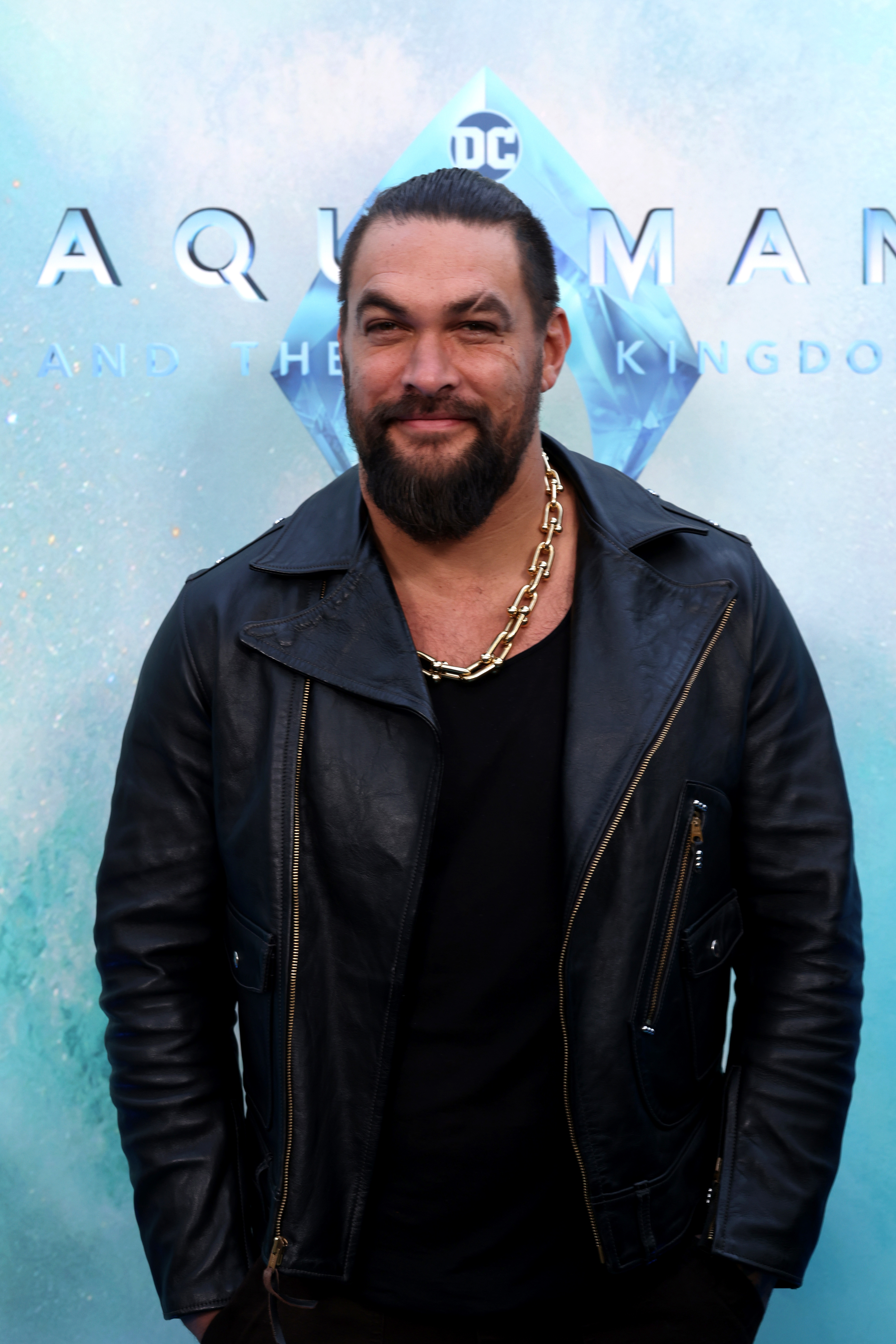 he&#x27;s at the premiere for aquaman wearing a leather jacket