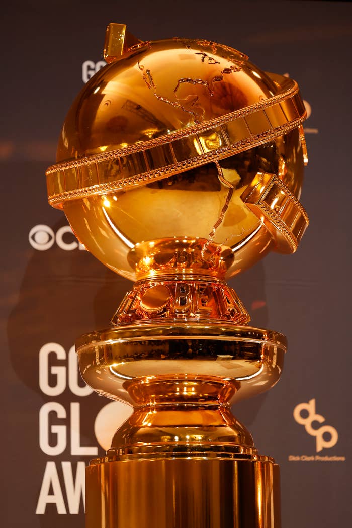 A closeup of a large Golden Globe statue