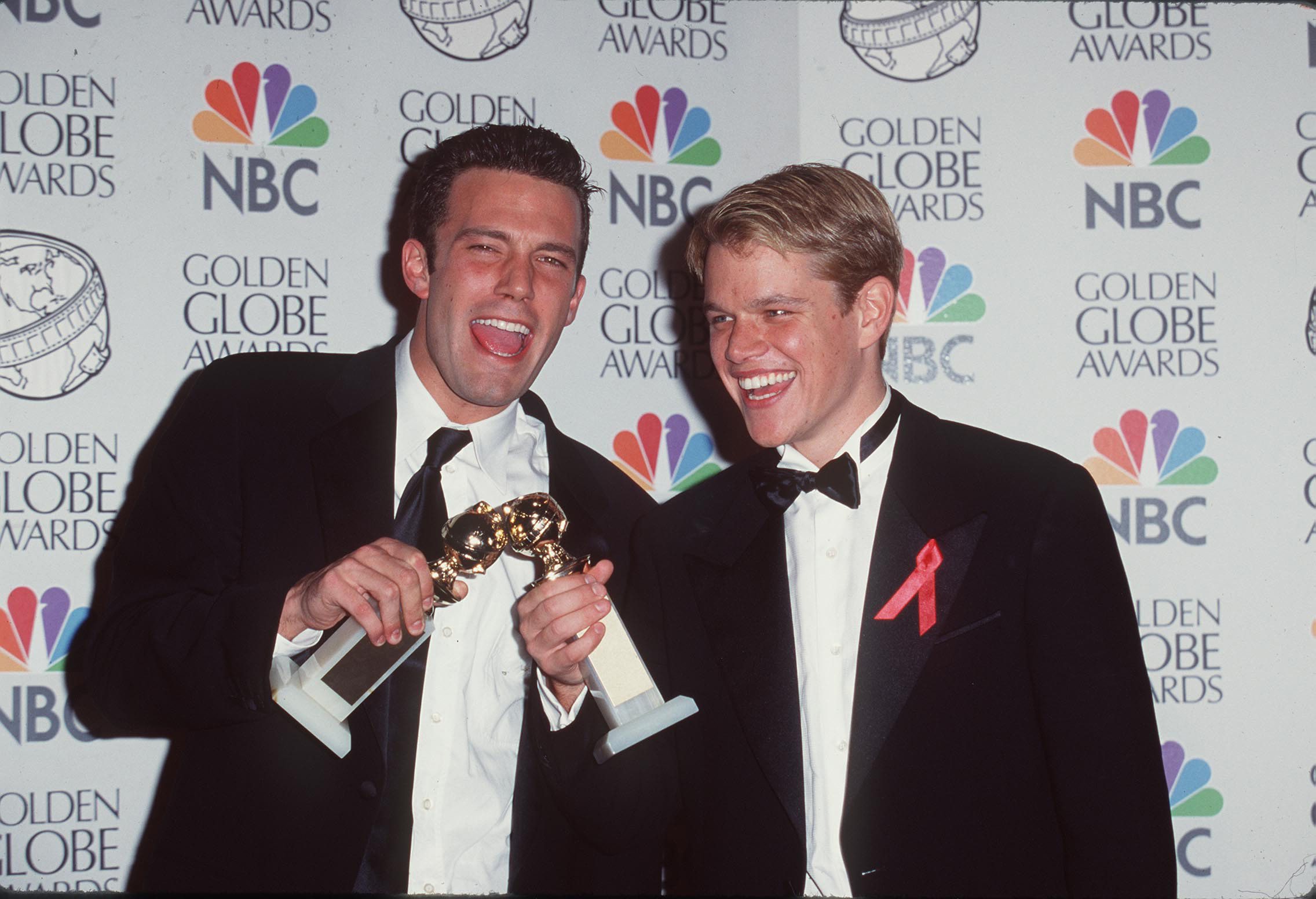 Ben and Matt holding their Golden Globes