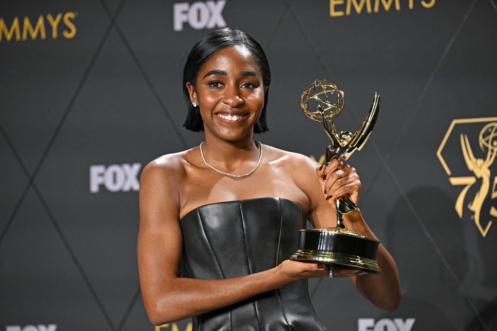 Ayo Edebiri holding her Emmy award