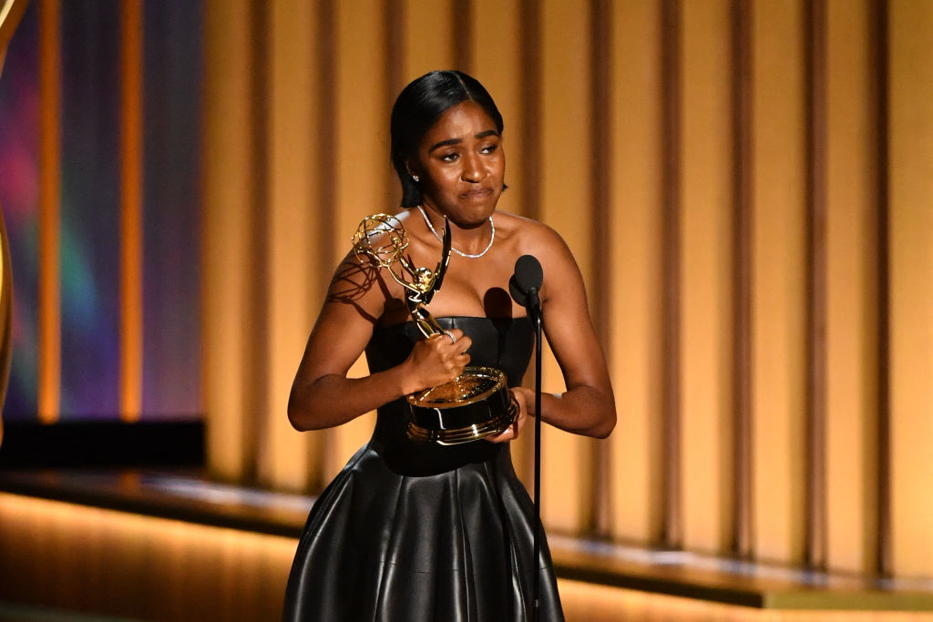 Ayo onstage with her Emmy