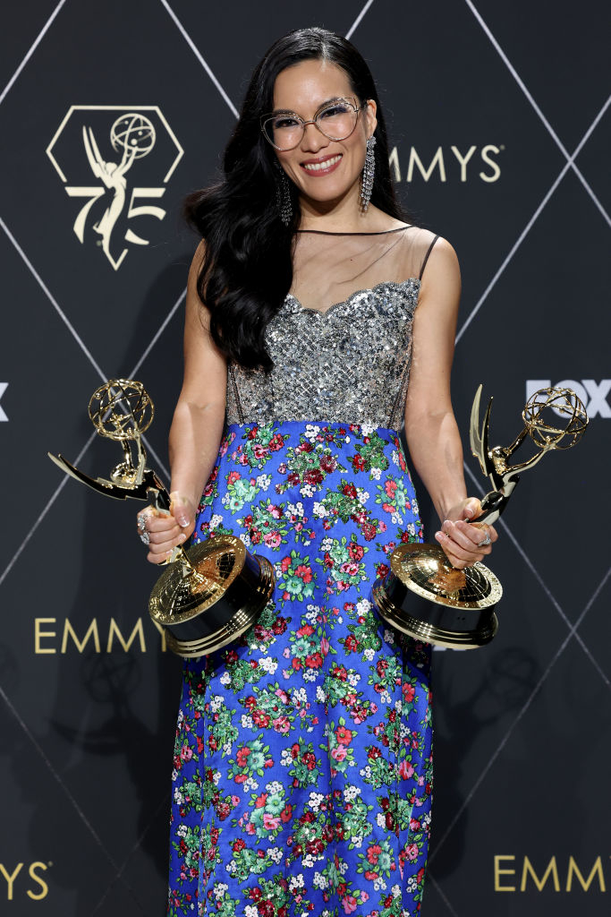 Ali Wong holding her two Emmys