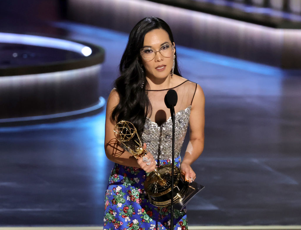 Ali Wong onstage with her Emmy