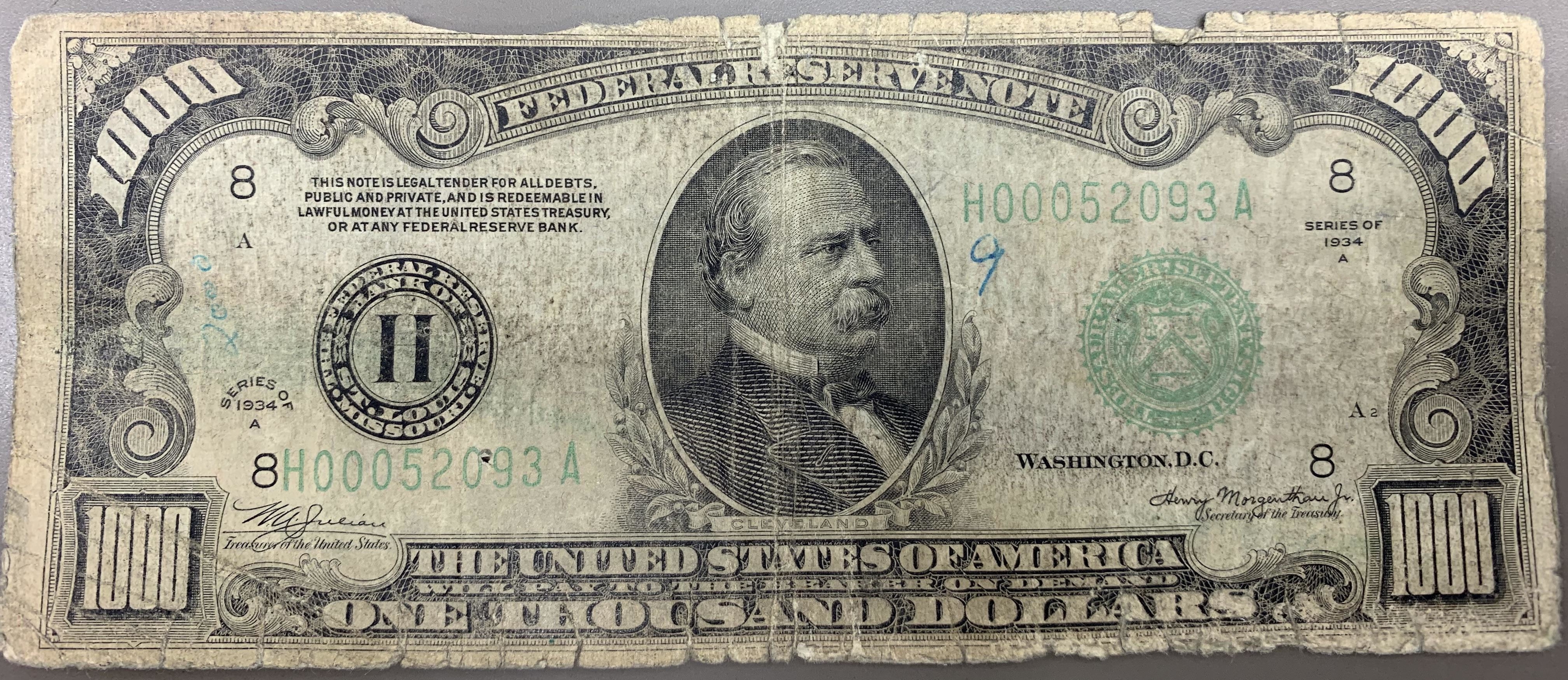 A $1,000 bill with the usual elements, plus Grover Cleveland in the middle
