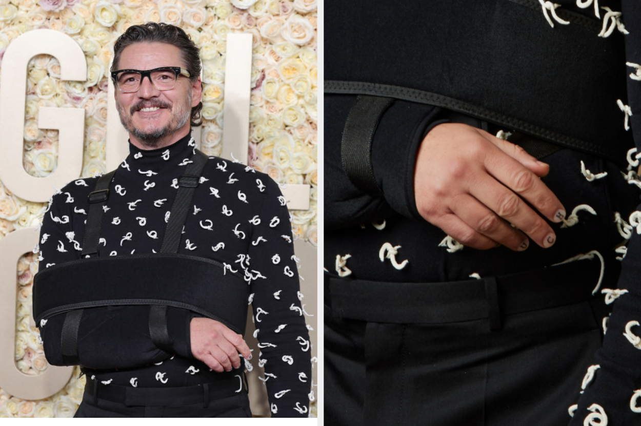 Closeup of Pedro Pascal and his nails that say &quot;ouchy&quot;
