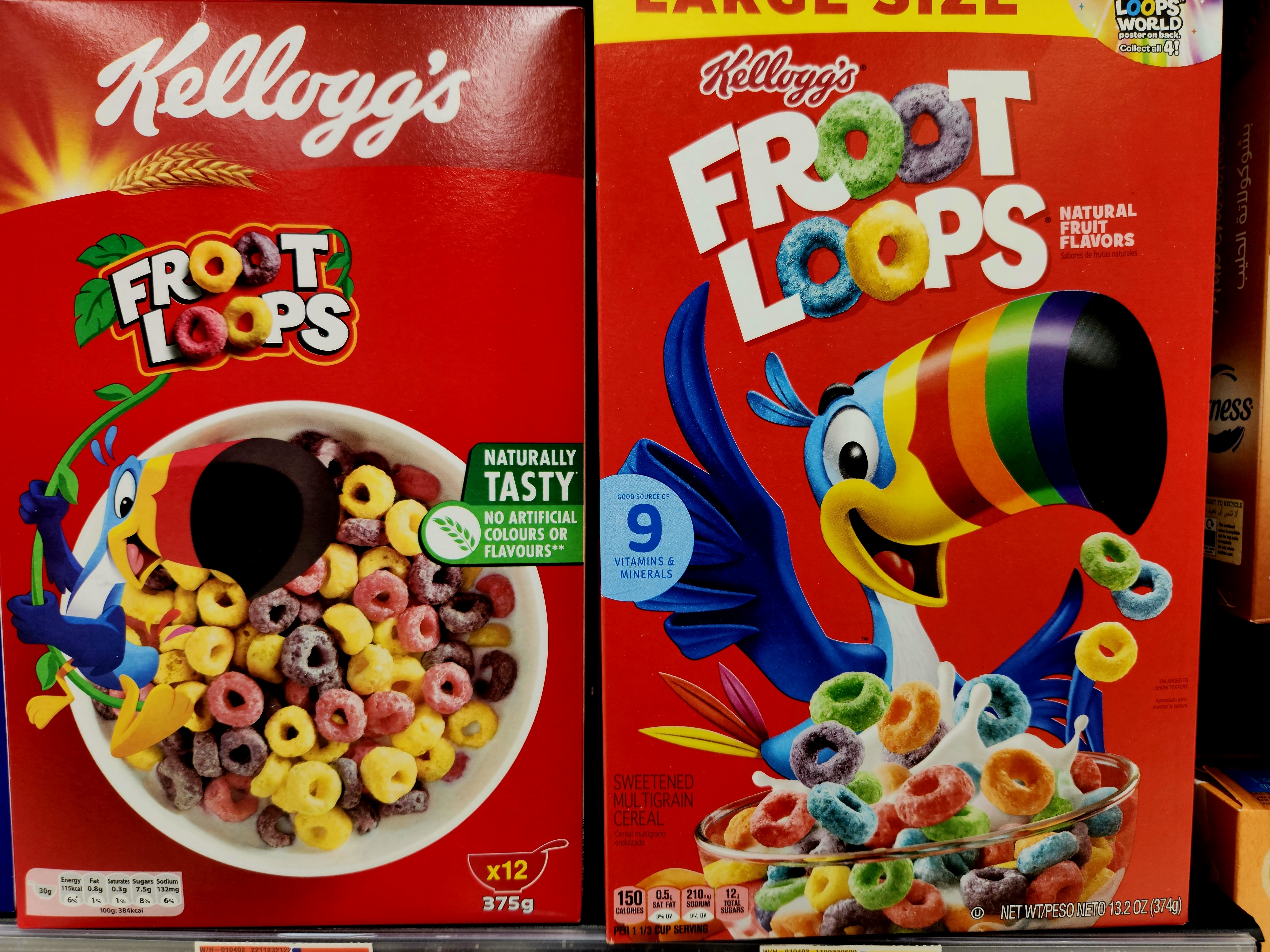The non-US box&#x27;s Loops are less pastel and varied (light yellow and shades of red and purple) than the US label (with green, blue, orange, purple, yellow, and red)