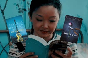 "The Nightingale," and "The Twin" book covers in front of "To All The Boys I've Loved Before" reading scene.