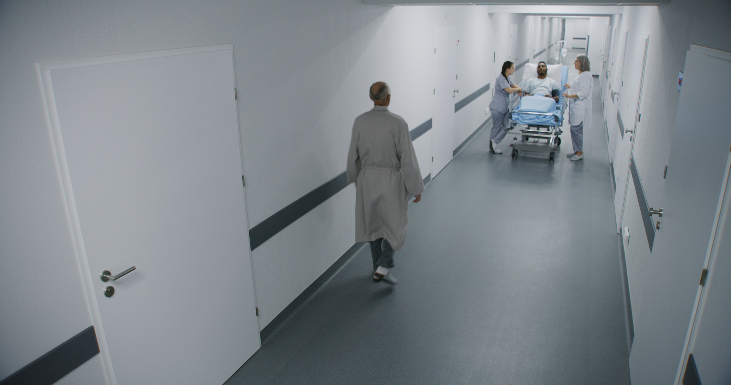 security camera view of patients in a hospital hallways
