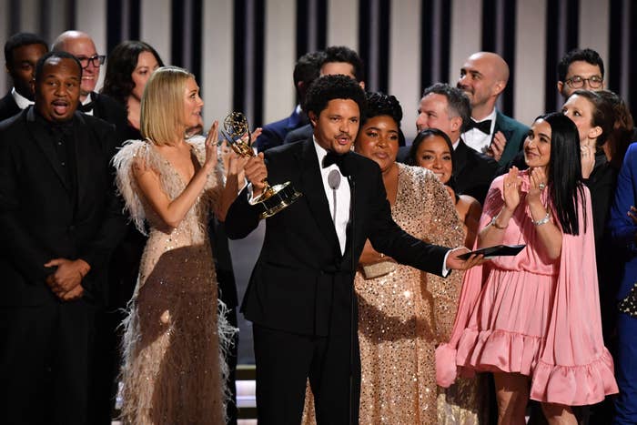 Trevor Noah and his crew accepting an Emmy award