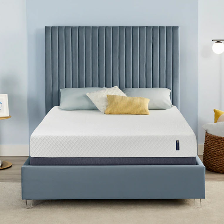 large memory foam mattress on bed frame