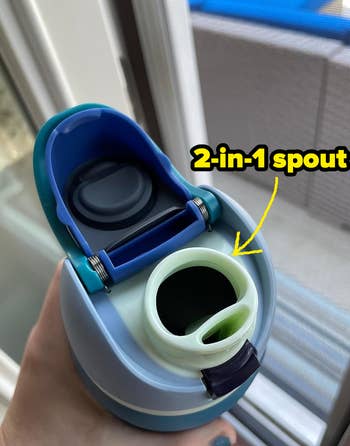reviewer showing 2-in-1 spout