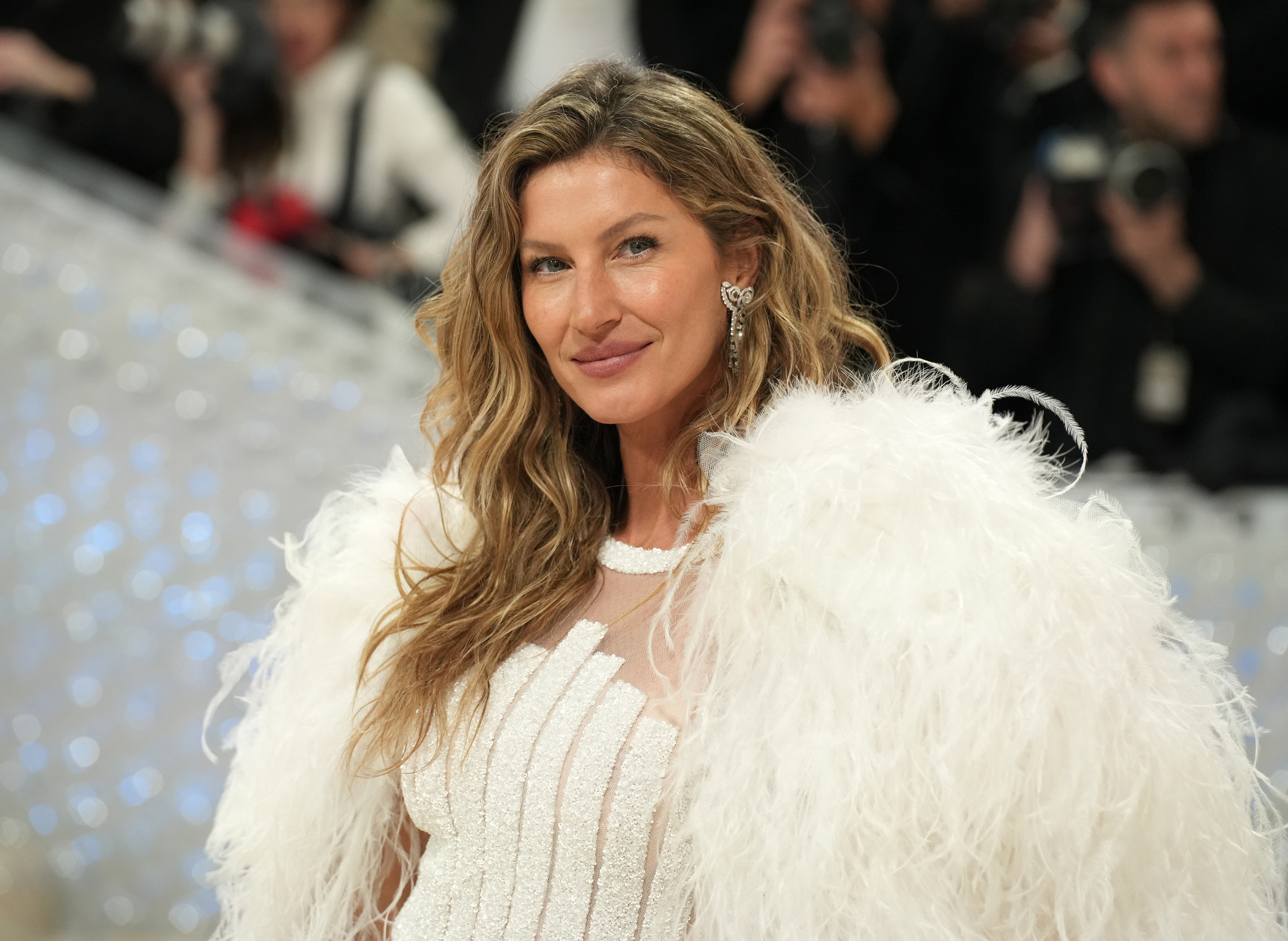Close-up of Gisele at a media event