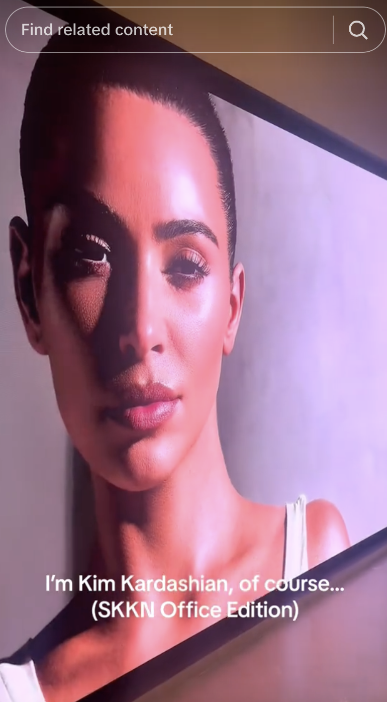 Closeup of a screen with Kim&#x27;s face on it