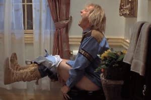 A scene from "Dumb and Dumber" where the character has explosive diarrhea while sitting on the toilet