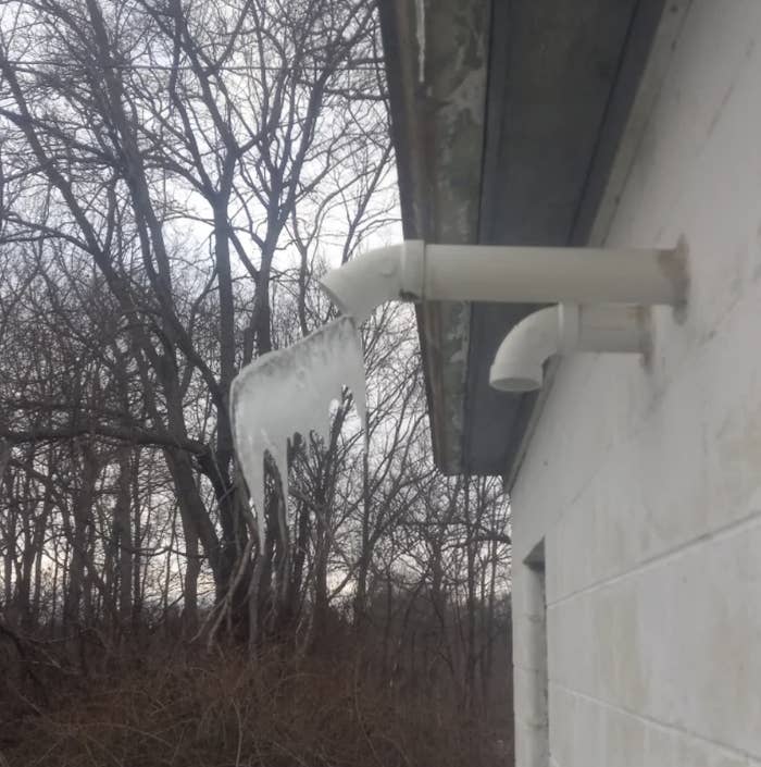 exhaust coming out of a pipe is frozen in the air