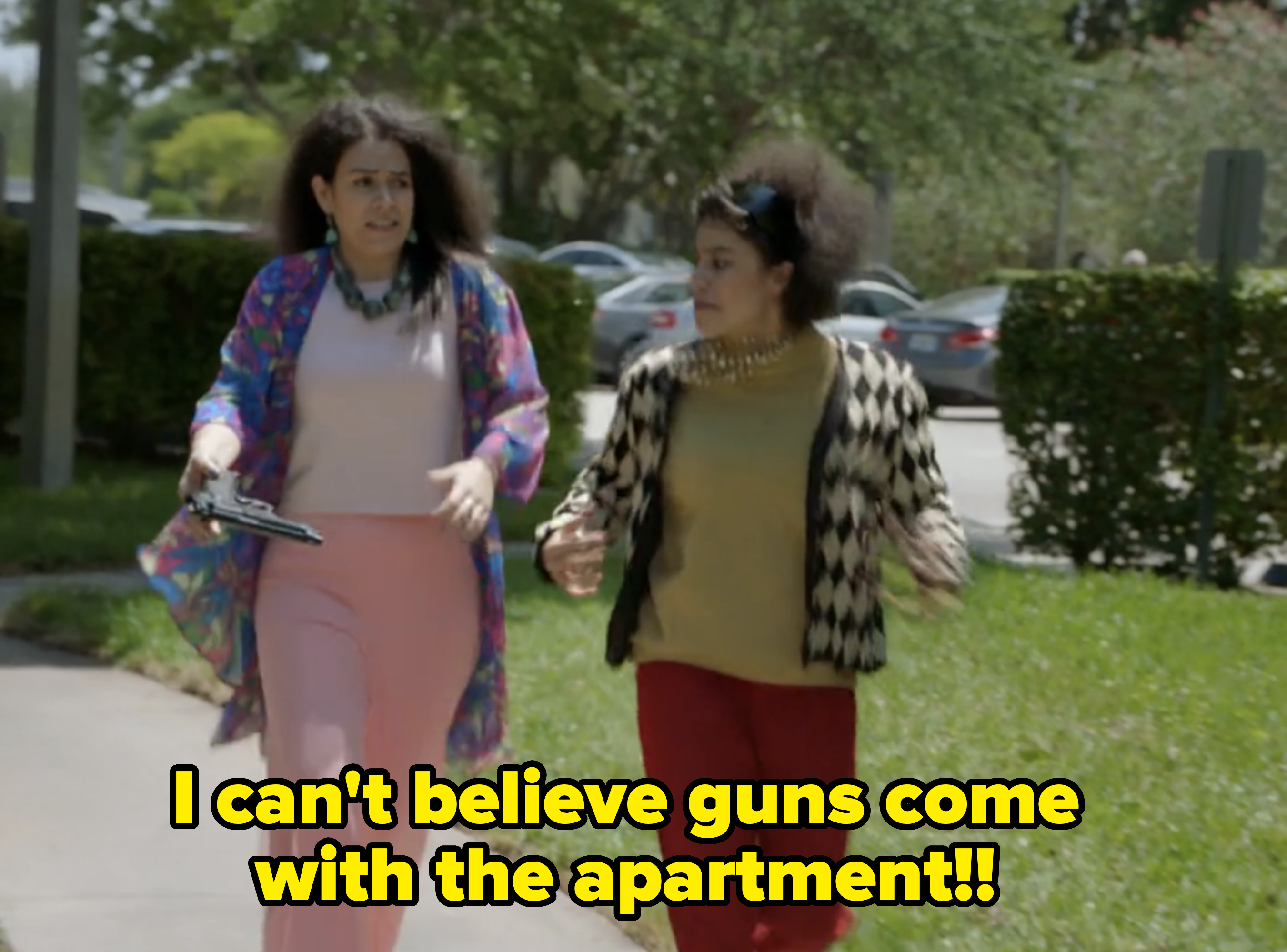 woman walking outside saying, i can&#x27;t believe guns come with the apartment