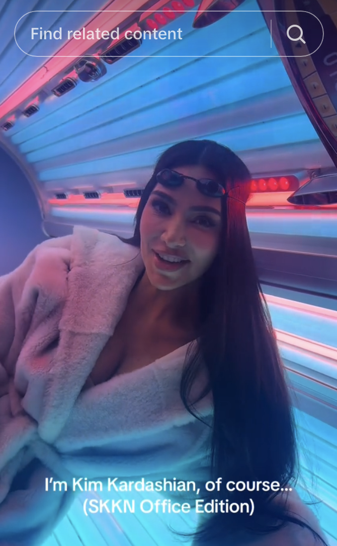 Screenshot of Kim in her tanning bed