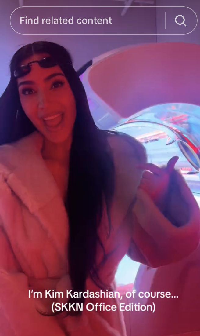 Screenshot of Kim in her red light bed