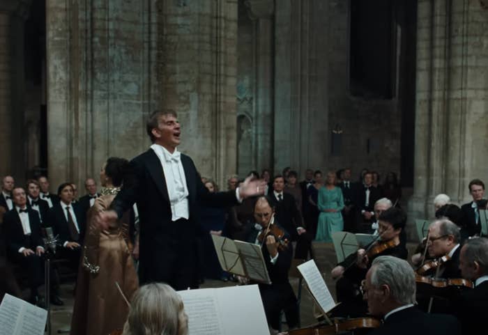 Bradley as Leonard conducting the orchestra