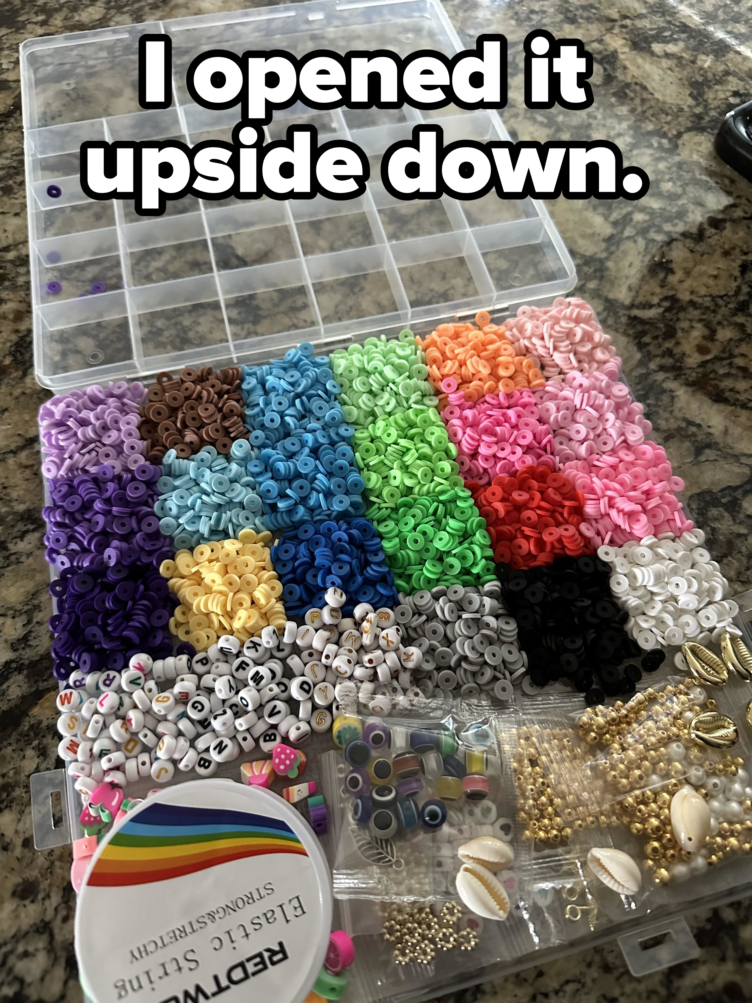 &quot;I opened it upside down&quot;: A plastic container with compartments containing all kinds of beads and baubles for making jewelry