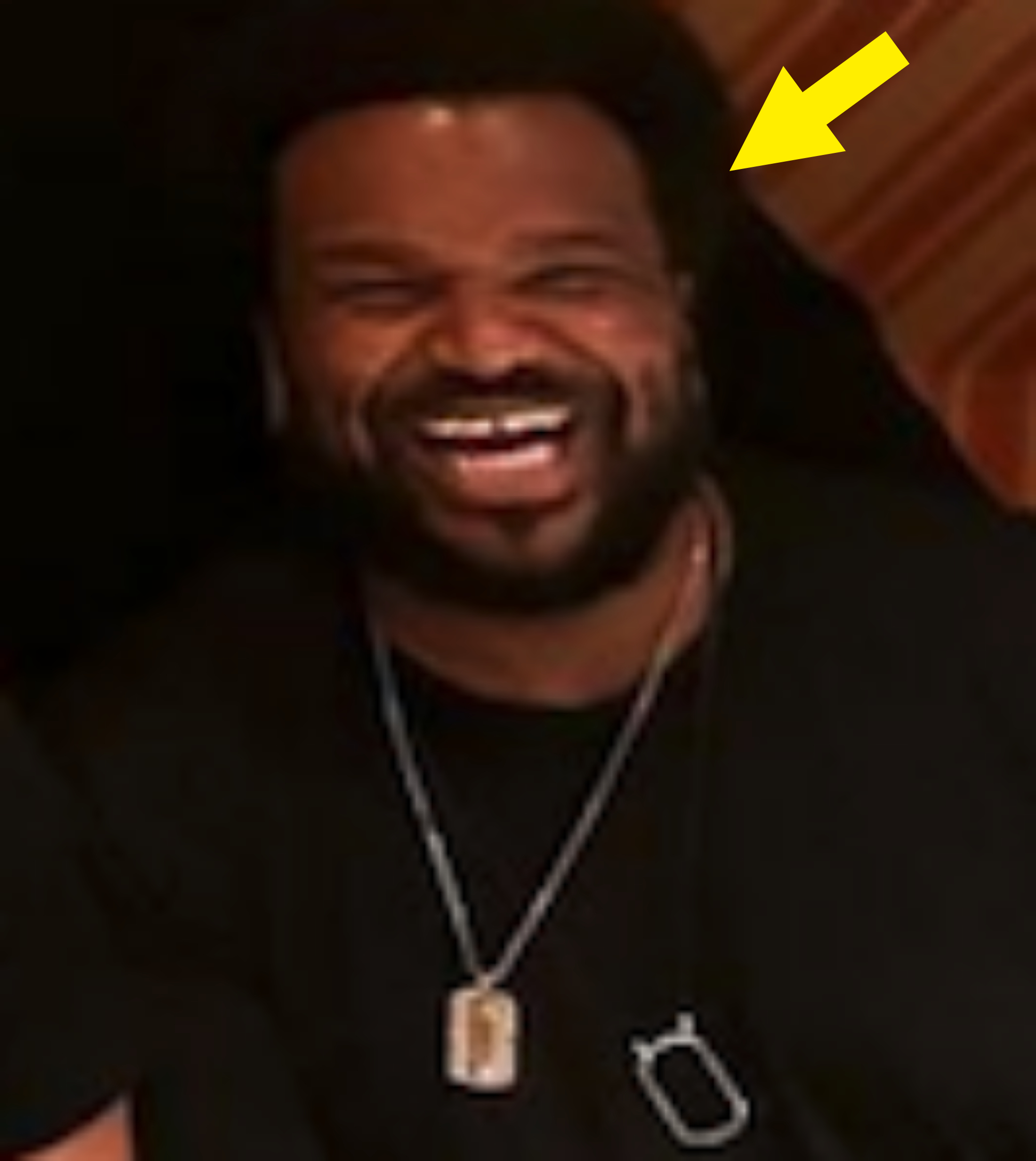 Arrow pointing to Craig laughing