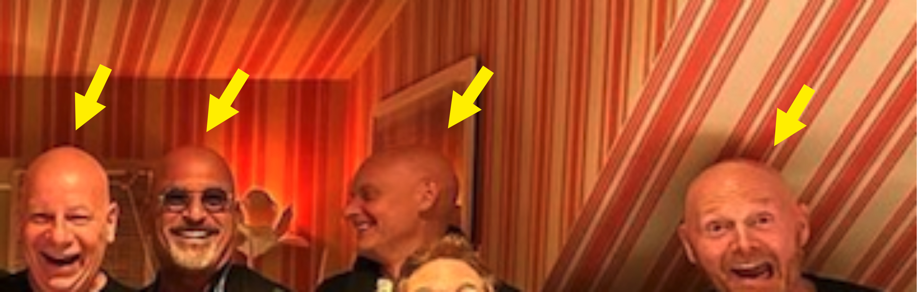 Arrows pointing to Jeff, Howie, Paul Vincent, and Bill laughing