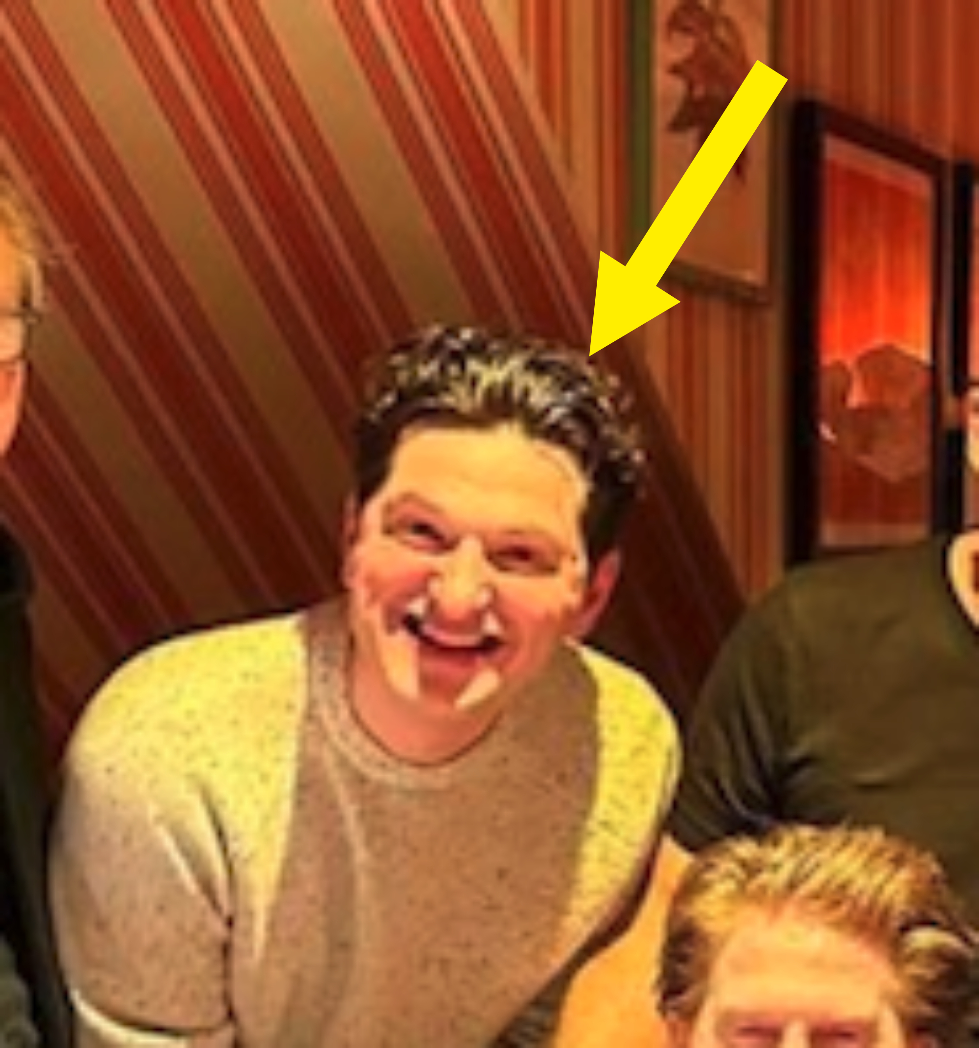 Arrow pointing to Ben laughing