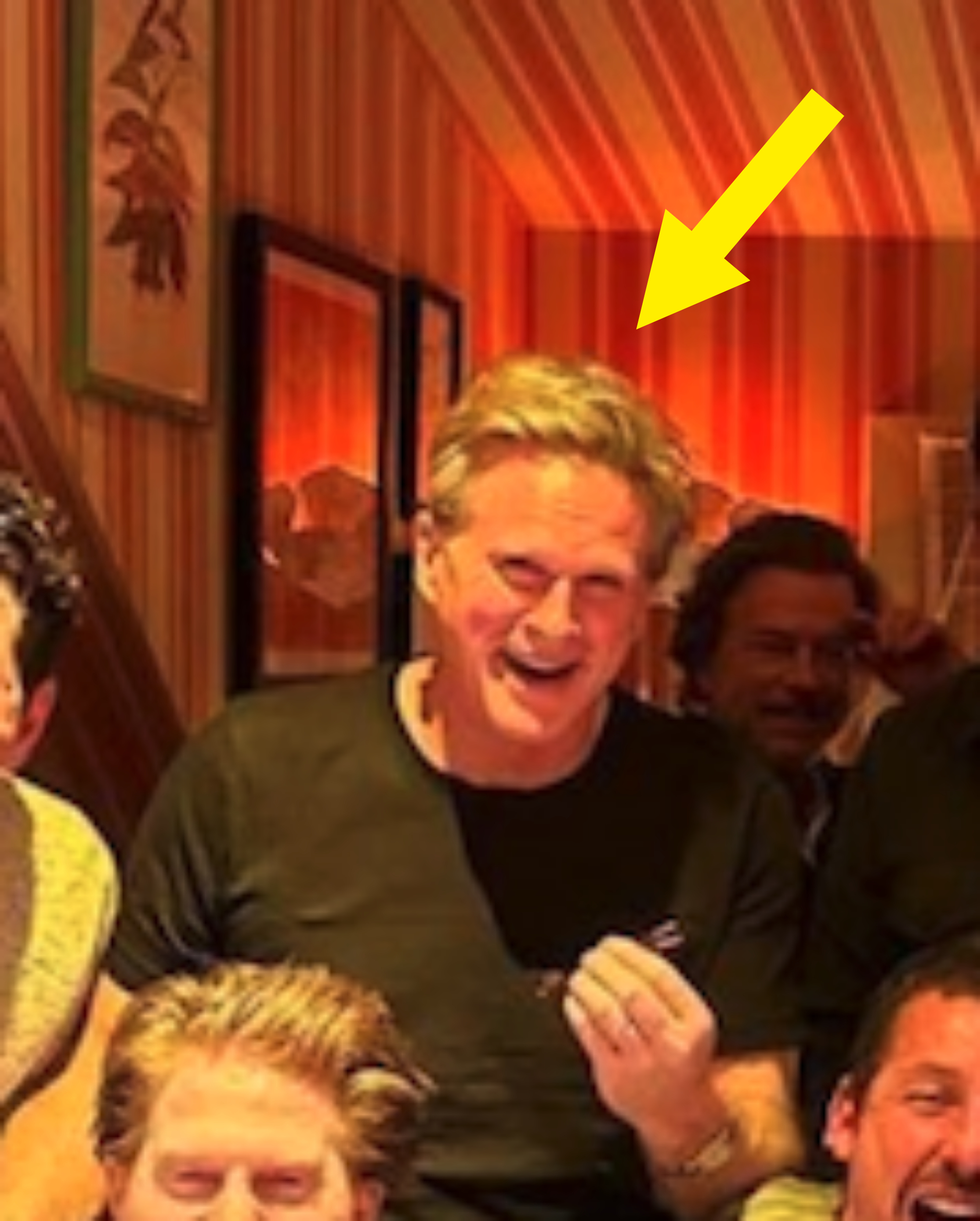 Arrow pointing to Cary (behind Seth) laughing