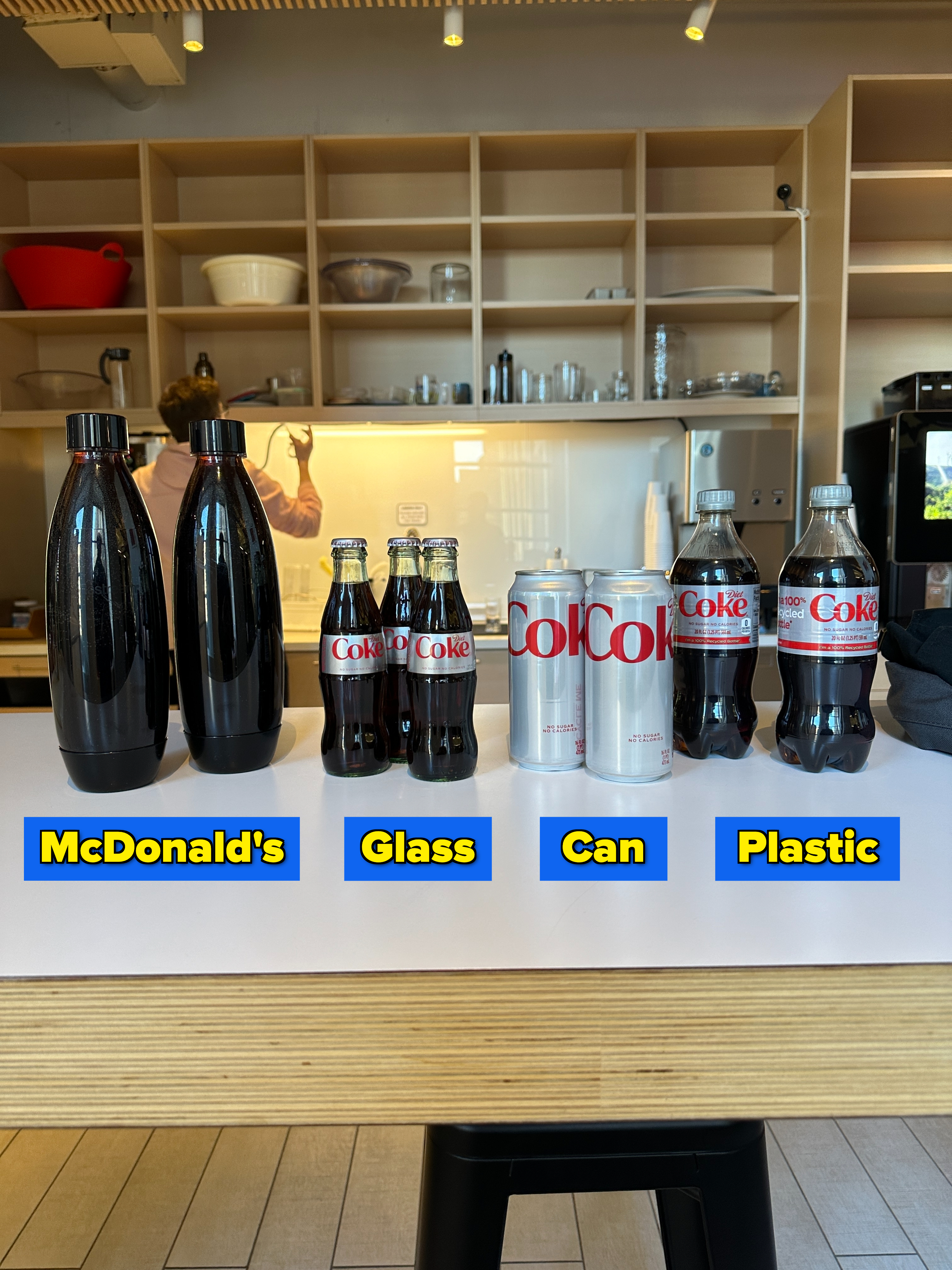 The four different types of diet coke lined up on a table