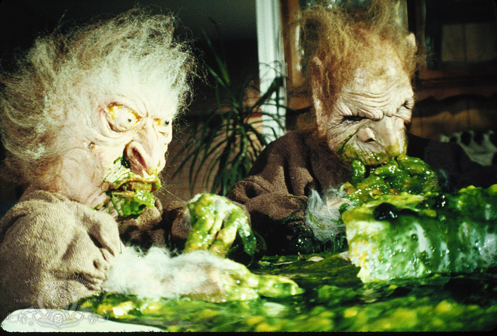 Goblins eating green human remains.