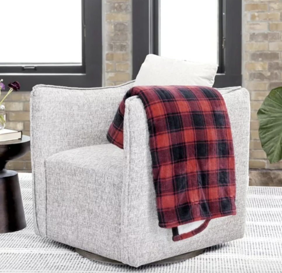 the blue plaid blanket on a chair