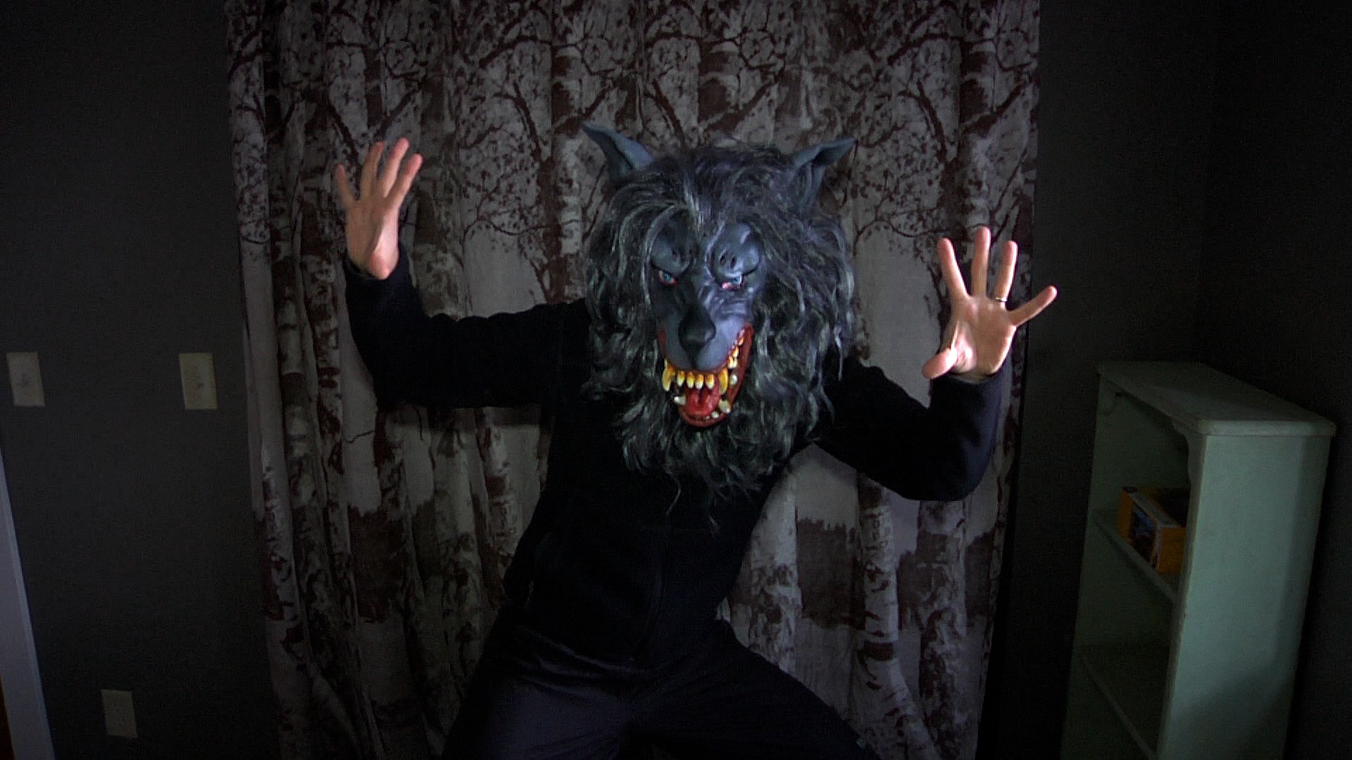 Mark Duplass wearing a wolf mask.