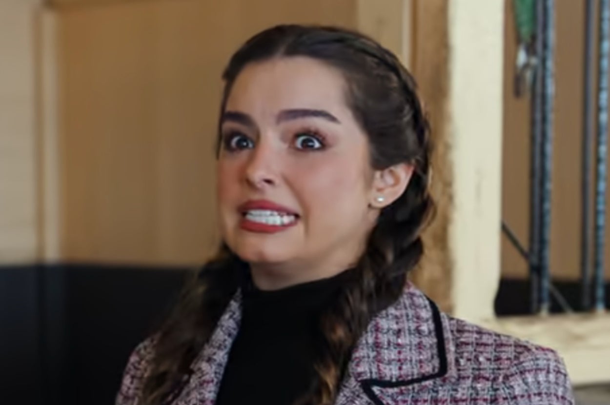 A girl giving a cringe face.