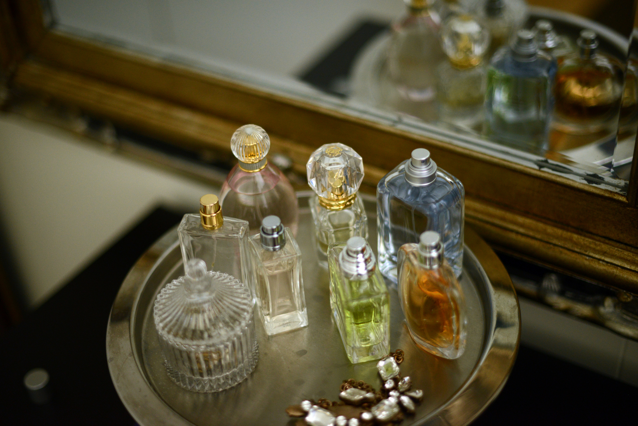 bottles of perfume on a tray