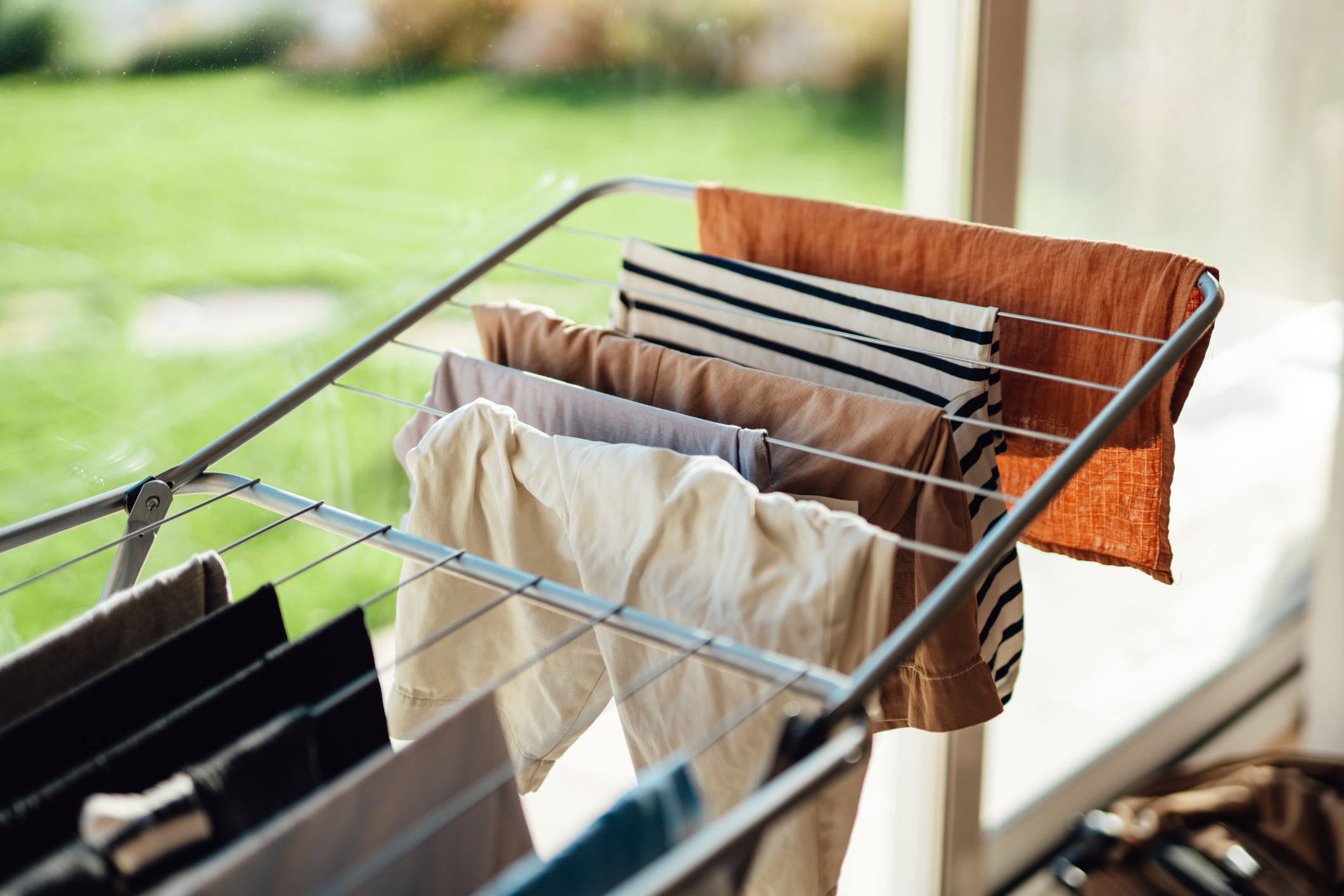 drying rack with clothes