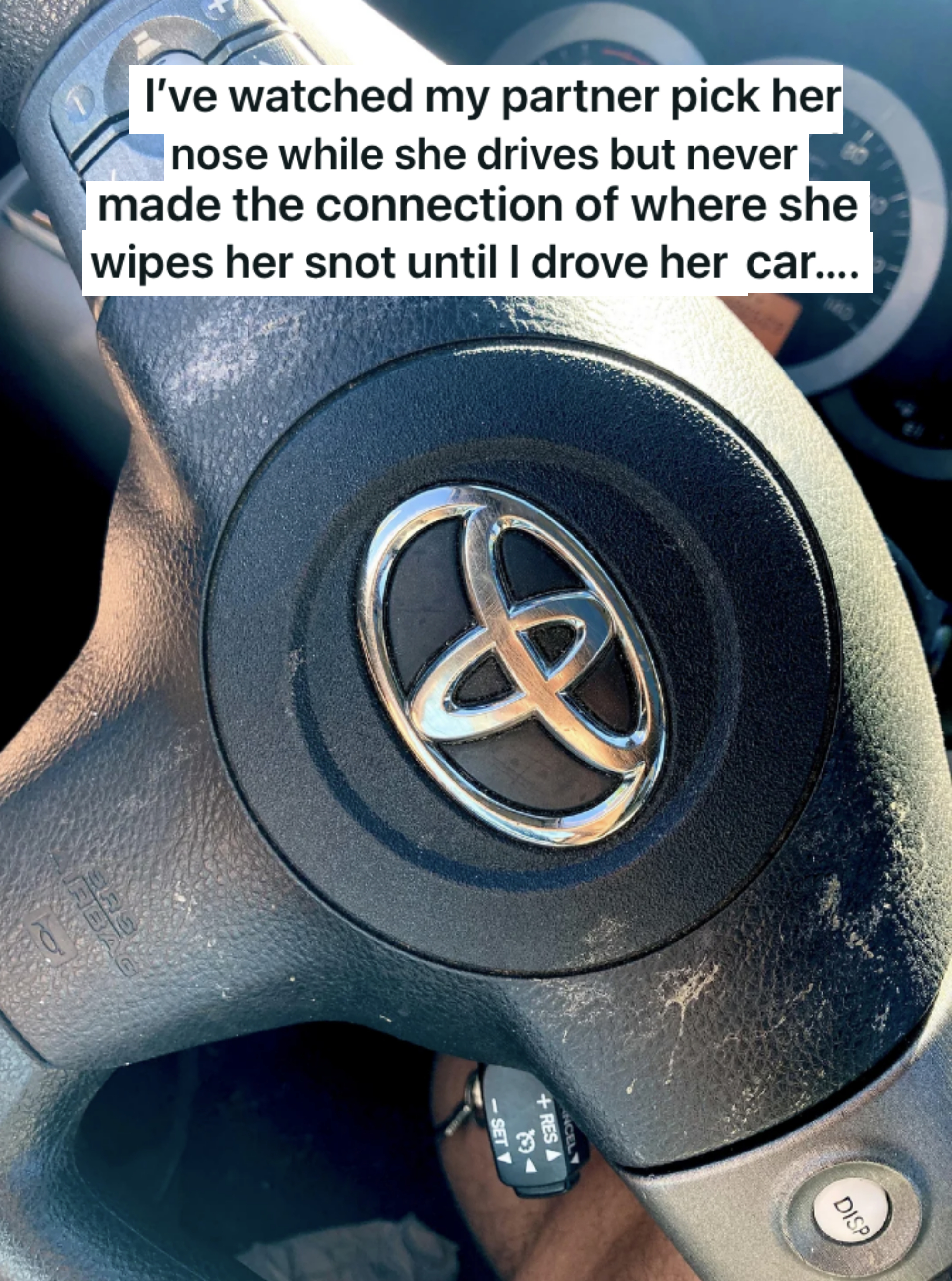 a steering wheel covered in boogers