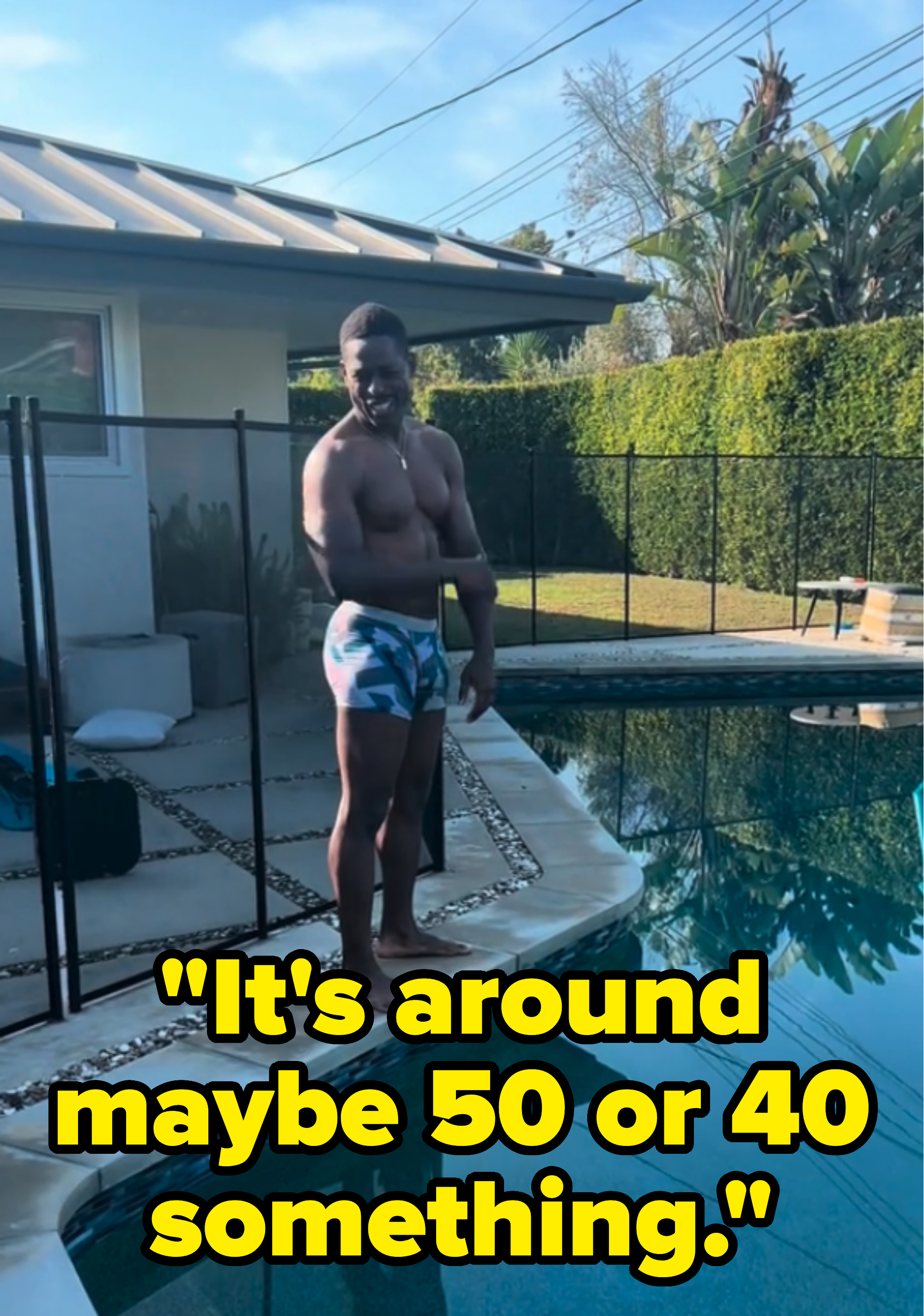 Sterling K. Brown standing by his pool