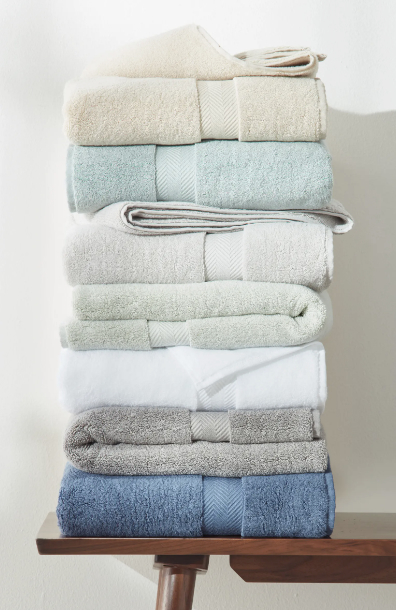 A stack of towels in different colors
