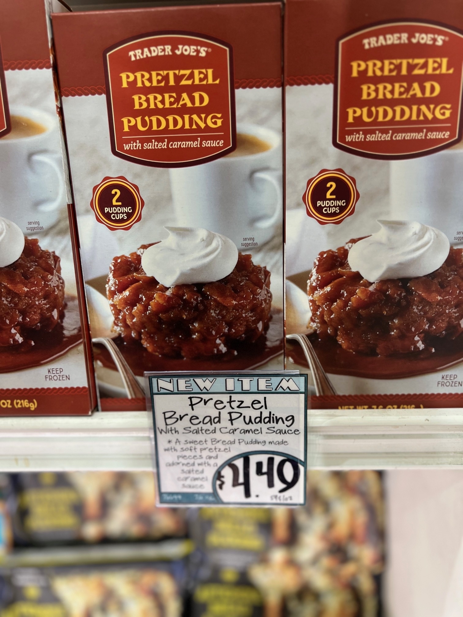 Boxes of Trader Joe&#x27;s Pretzel Bread Pudding on the store shelf
