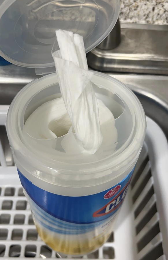 A Clorox wipe sticking out of its container