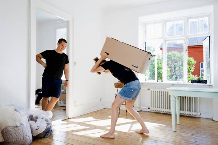 a couple moving into an apartment