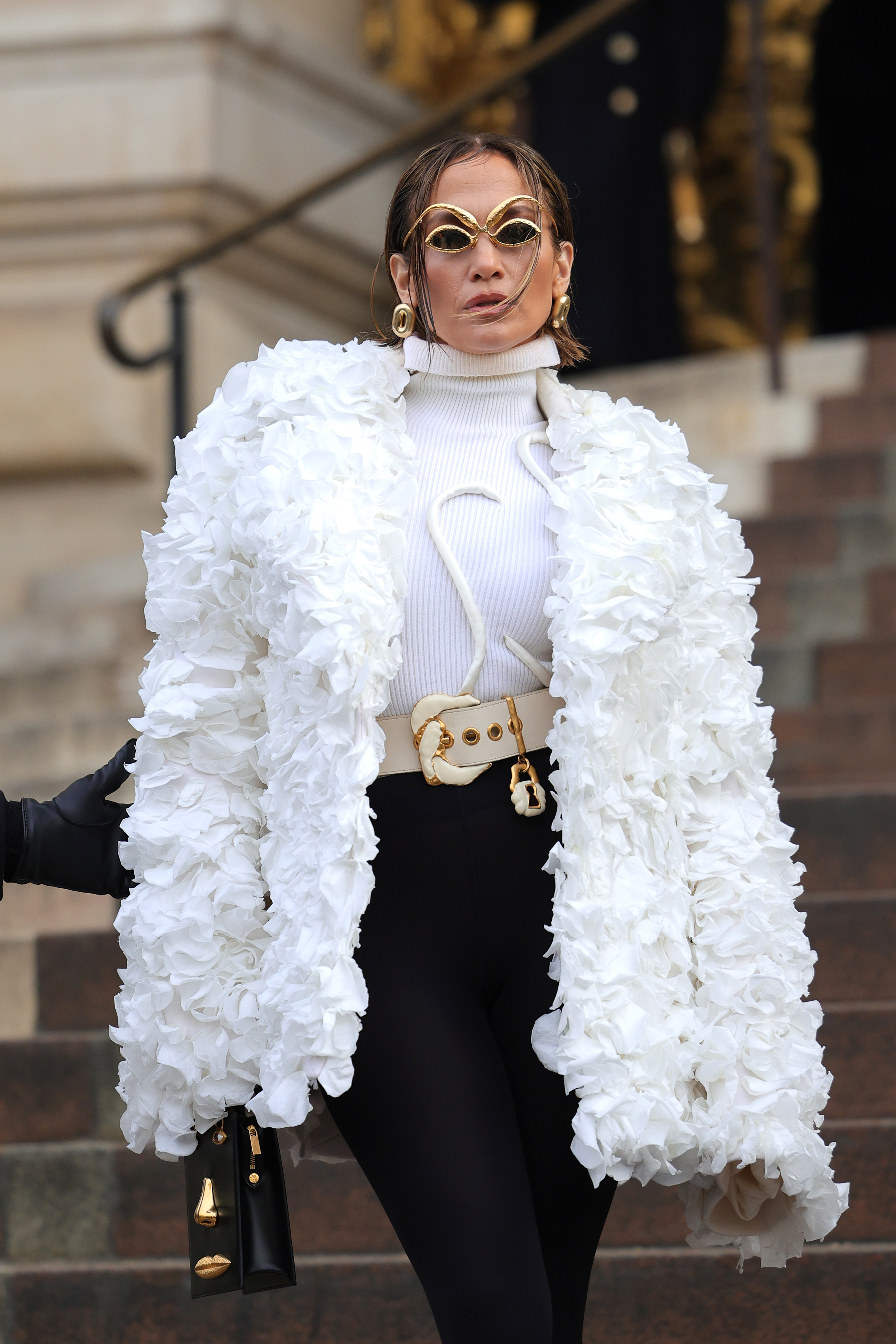Jennifer Lopez Wore White Wide-Leg Pants at Paris Fashion Week