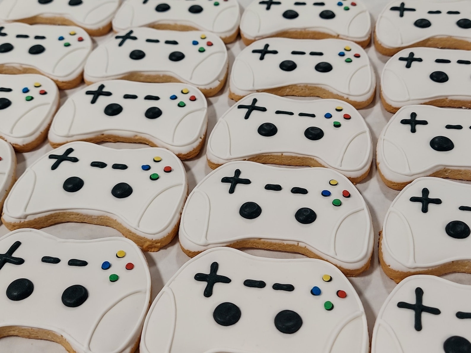 white game controller-shaped cookies