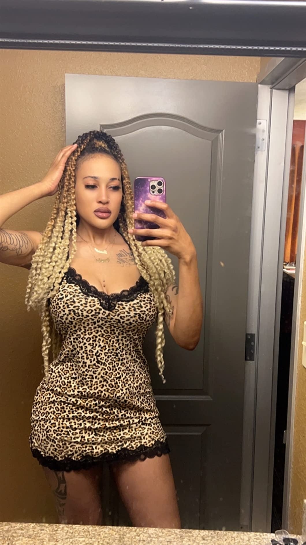 a reviewer wearing the gaffe  successful  leopard print
