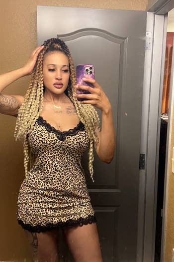 a reviewer wearing the gaffe successful leopard print