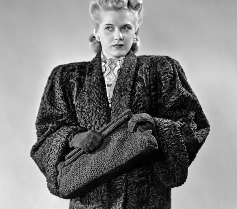 Closeup of an old-fashioned woman in a fur coat