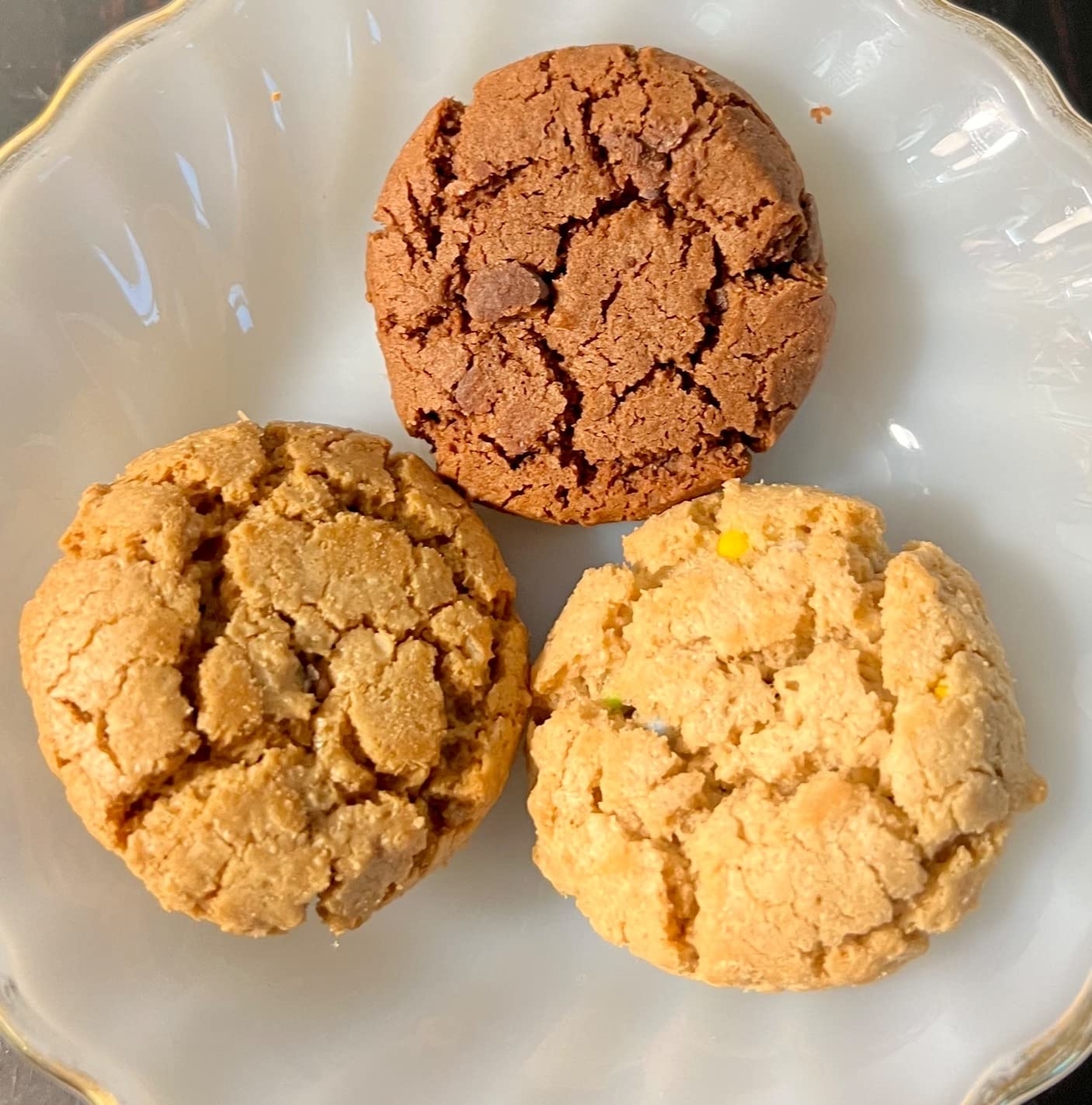 reviewer image of one of each flavor cookie