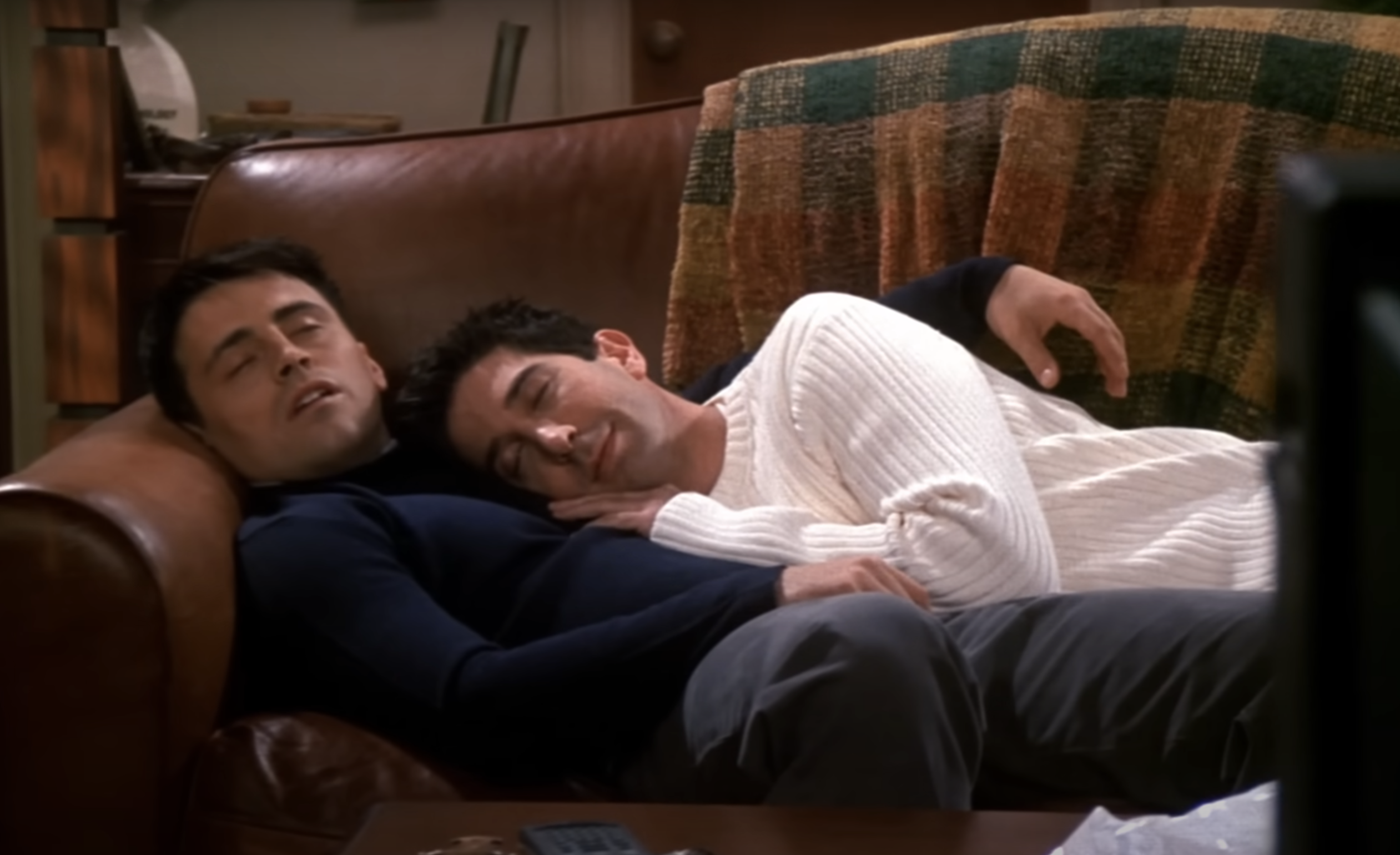Joey and Ross from &quot;Friends&quot; asleep, cuddling on the couch