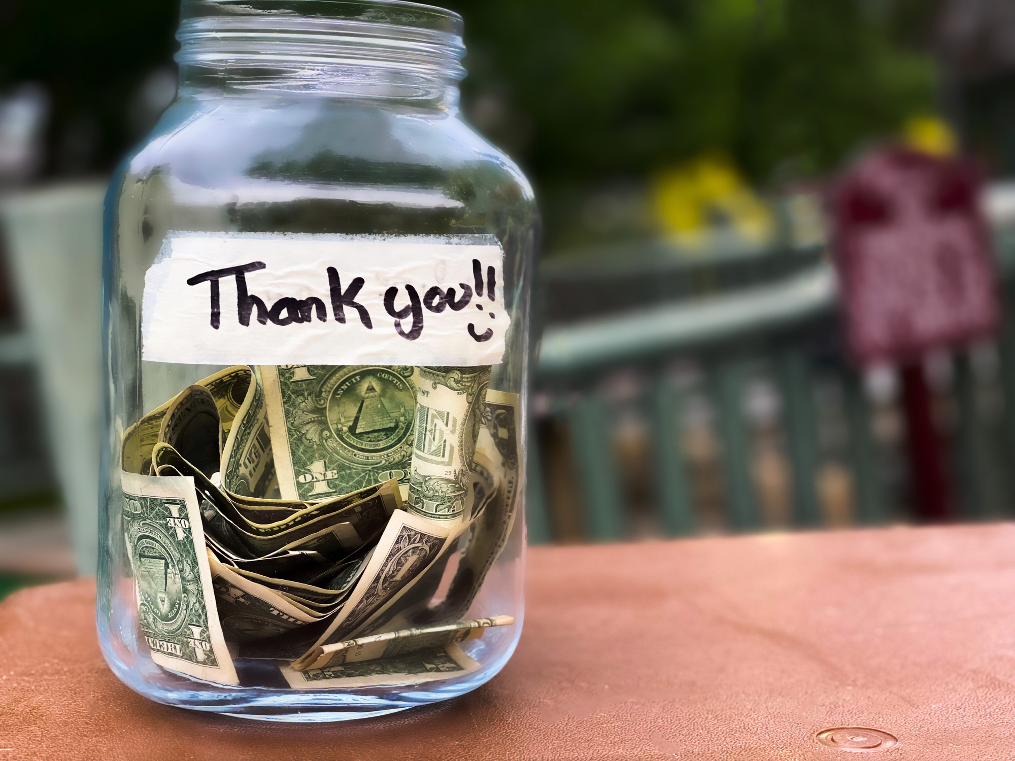 tip jar filled with money