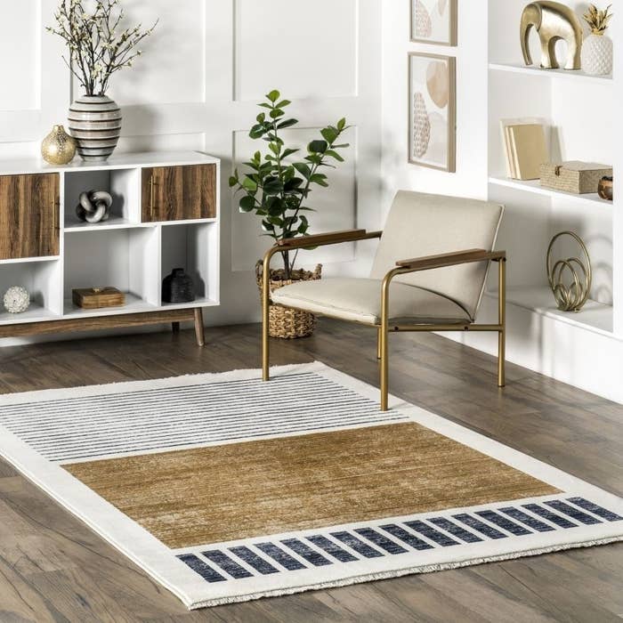 black, white, and brown striped rug